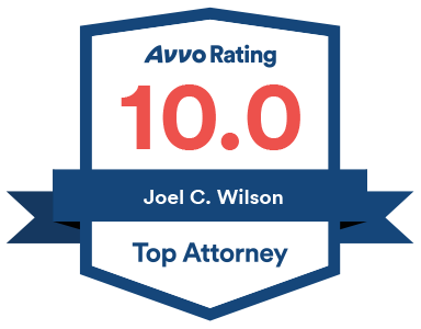 A badge that says avvo rating 1 0. 0 for joel c wilson top attorney
